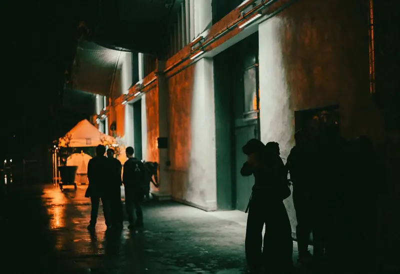Night courtyard with silhouettes. Photo by Iheb Fehri